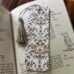 Decorative plantable bookmark with intricate pattern on an open book